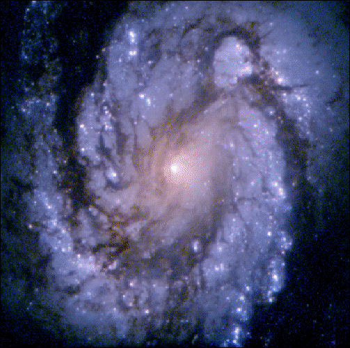Image of a spiral galaxy in pale blue