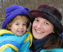 woman and child in colorful hats